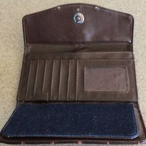 Brown & blue denim clutch. Decorated with silver heart.